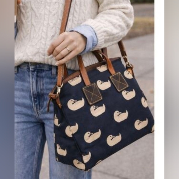 Dooney & Bourke Handbags - Dooney & Bourke Navy Canvas Tote Bag with Beige Duck Print and Brown Trim EUC